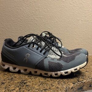 On Running Gray and Black Athletic Shoes